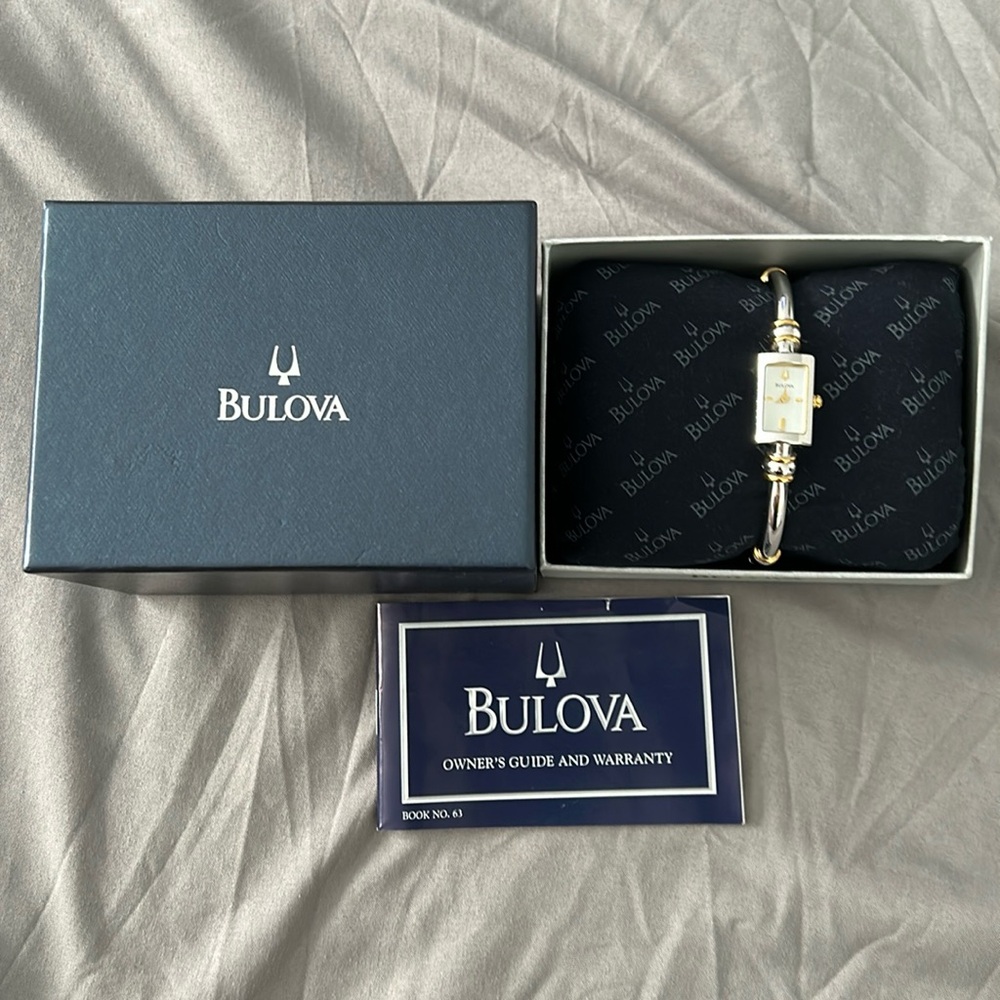 BULOVA, Ladies two tone bangle dress watch.